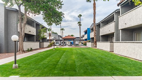 Cottonwood Creek mail box area with grassy area.
